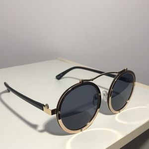 black and gold round sunglasses